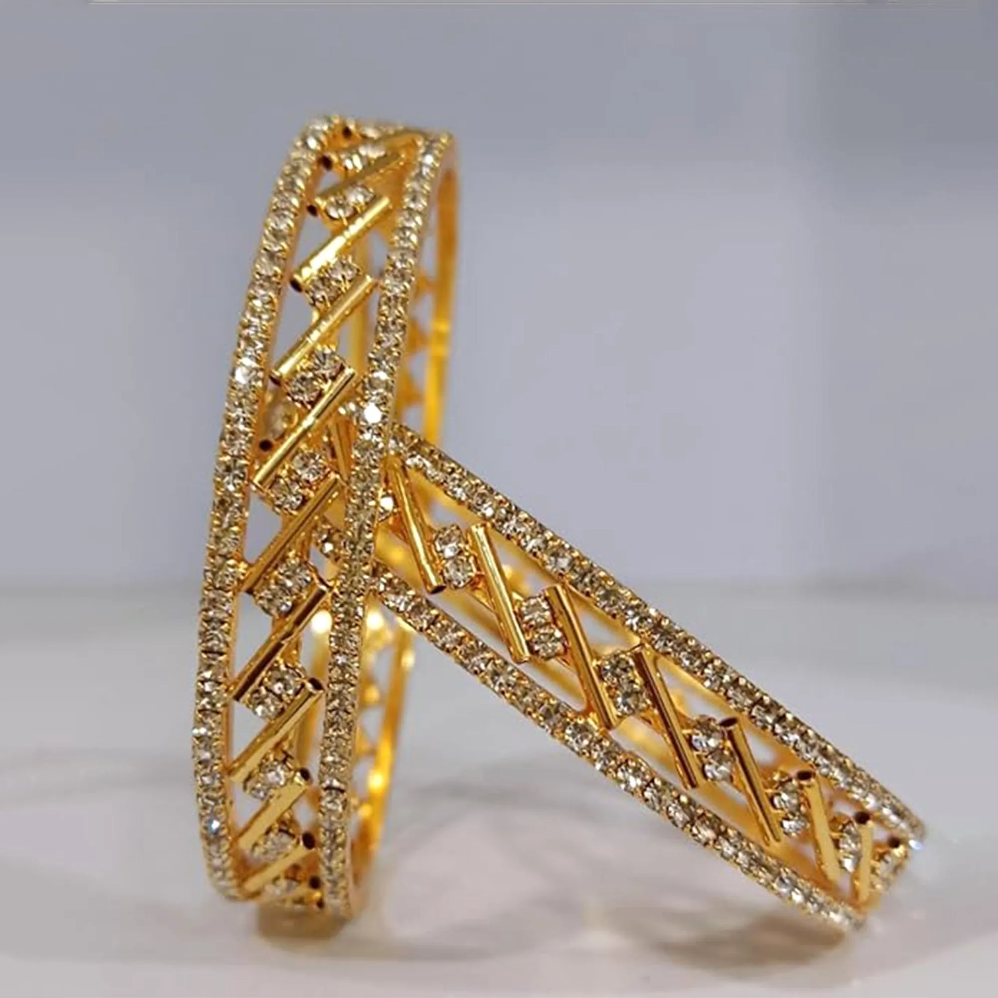 Estele Ethnic Criss-Cross Bangles for Women ?C Radiant Gold Plated|Size 2.6|Wedding & Festive Jewellery ?C OSBR-VK11039-26 BANGLE