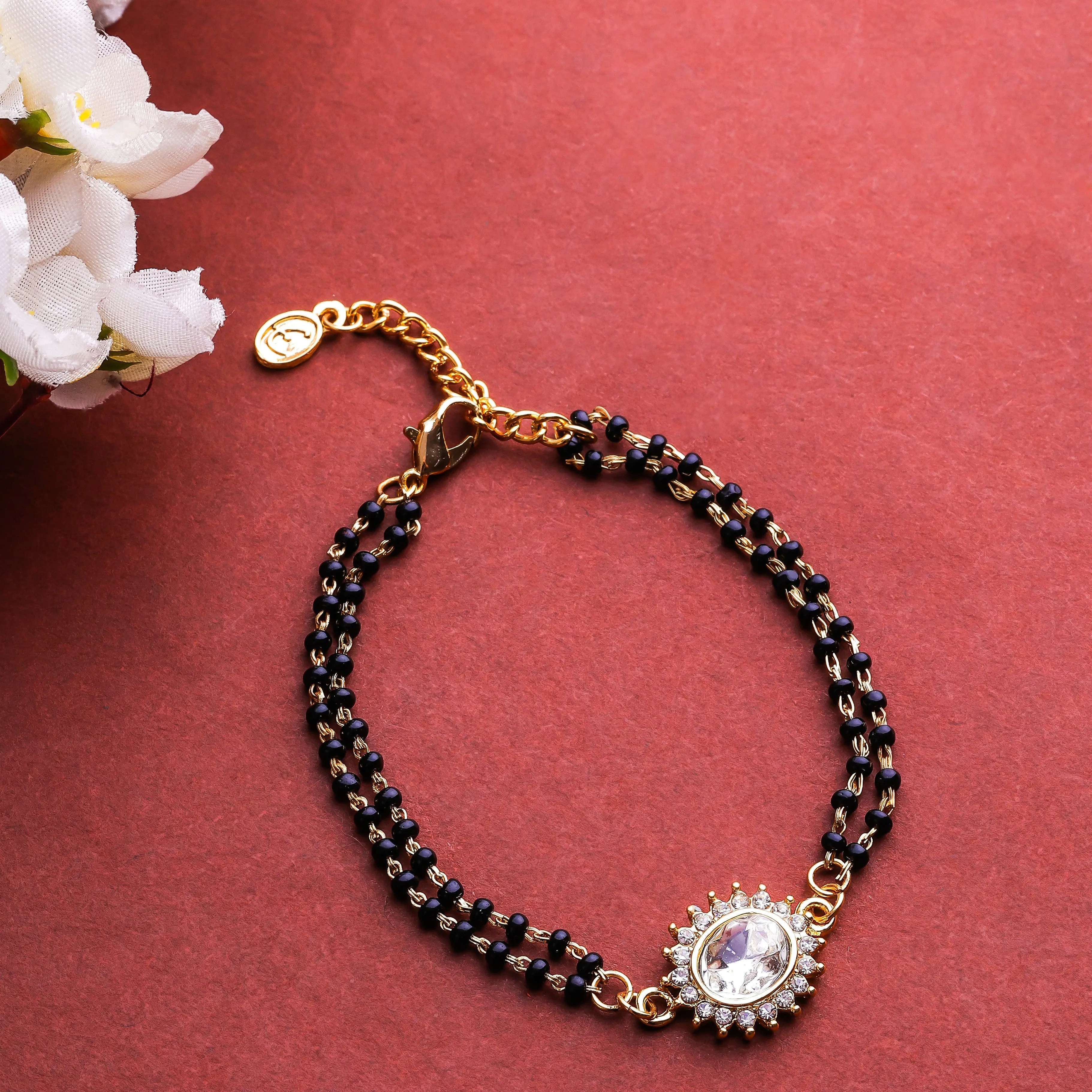 Estele Gold Plated Evil Eye with Black Beads Bracelet with Austrian Crystals & Kundan for Women