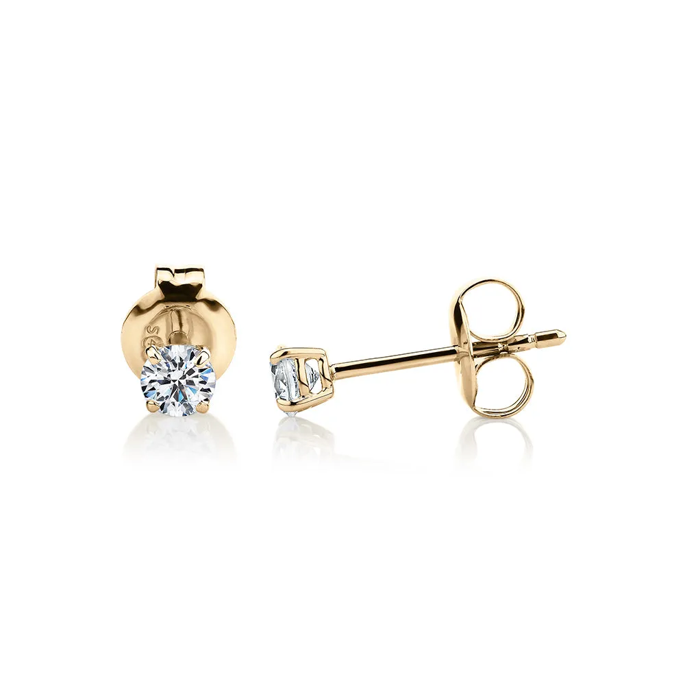 Round Brilliant stud earrings with 0.25 carats* of diamond simulants in 10 carat yellow gold