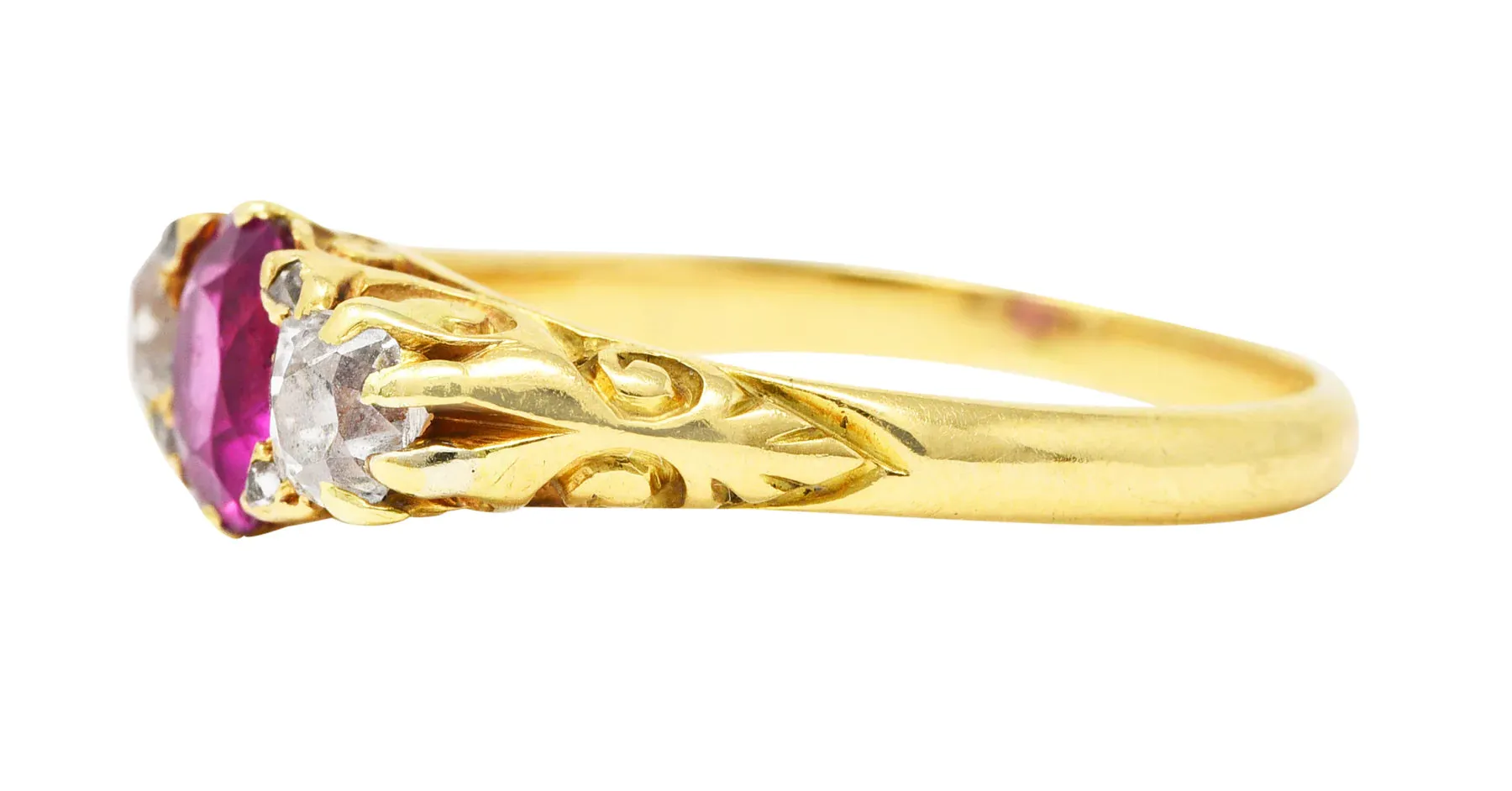 VICTORIAN 1.64 CTW RUBY OLD MINE CUT DIAMOND 18 KARAT YELLOW GOLD SCROLLING THREE-STONE ANTIQUE RING